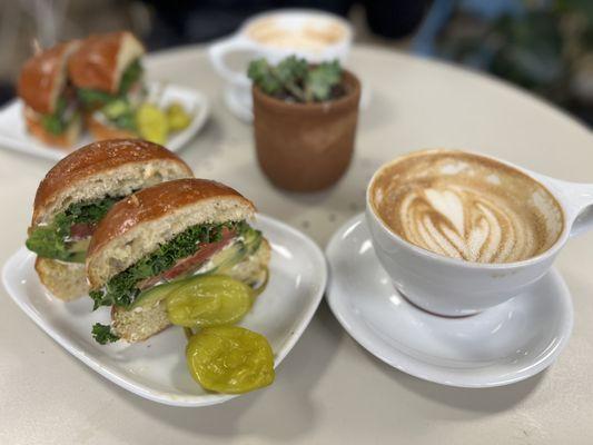 Avocado sandwich and vanilla latte with a friend