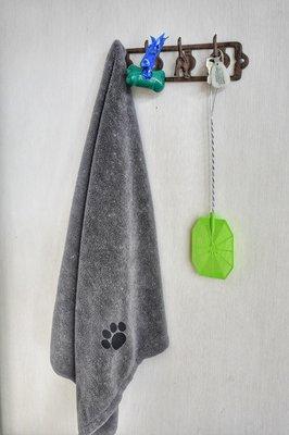 They think of everything ! Dog wast3 bags and towel to dry off your furry friend!