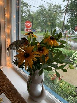 Fresh cut flowers from their own garden on all the inside tables