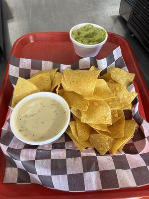 Chips and queso and guacamole