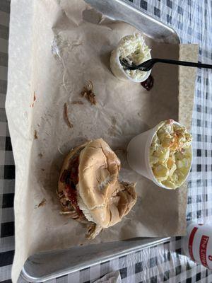 Pulled pork sandwich, Cole slaw and potato salad.