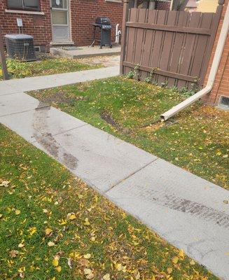 Mud smeared on the sidewalks from the tire tracks of Cmark  Services to Madison Manor Condominiums coowners. Deep gouges in the grass.