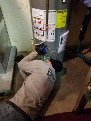 Jonah lighting a water heater