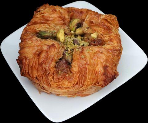 Pistachio Kouign Amann. Delicious! Buttery, flaky, nutty, and sweet.