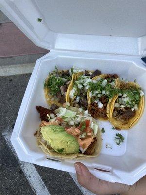 fish taco (one with avocado) as well as lengua, cabeza, carnitas, and el pastor tacos~~