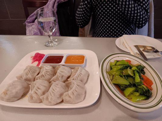 Steamed beef momo with sauteed bok choi