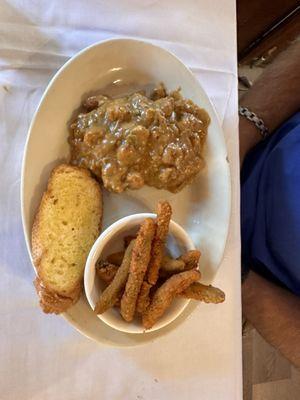 Crawfish étouffée with fried green beans