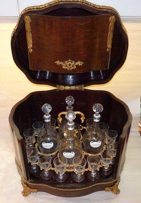 A Louis XV Baccarat Tantalus decanter set, in excellent condition.