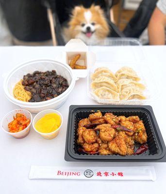 B3 Steamed Meat Dumplings ($9.95), H11 Kkanpung Saeu: Fried Prawns in Hot Pepper Sauce ($23.95), J1 Jjajangmyeon: Black Bean Noodle ($10.95)