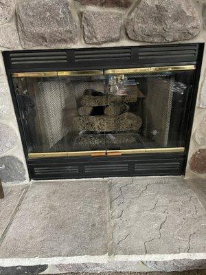 My sparkling clean fireplace after Justin finished cleaning the glass.