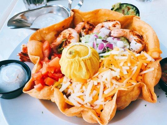 Crispy taco salad with Cajun shrimp. It's yummy, and the taco is really crispy.