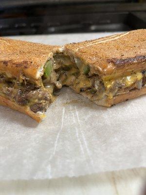 Philly cheesesteak sandwich nice and cheesy juicy crispy bread