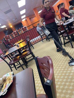 Vacuuming as soon as we were served our food. The dust was provided at no extra charge