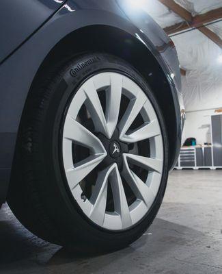 Cleaning of the faces and barrels of the wheels prior to coating them on this Tesla.