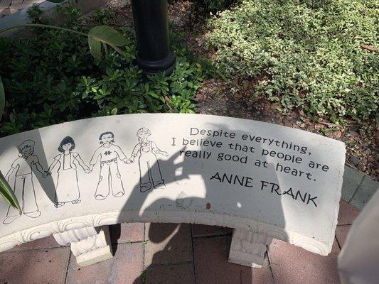 One of 14 hand carved stone benches with a quote in The Garden of Humanity by Yaacov Helier