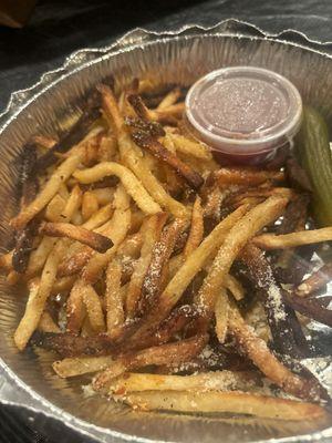 Supposed to be the garlic Parmesan fries but all I see are burnt ends and a pickle