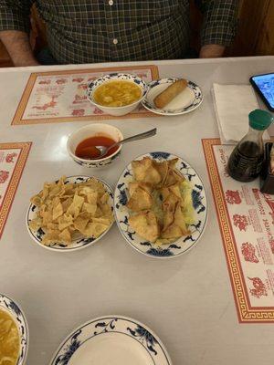 Egg drop soup, spring roll, and crab Rangoon