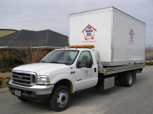 Our Mobile Attic delivery truck is a standard role back truck.  This allows us to easily place your storage unit where required.