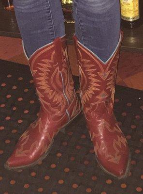 Bartender wears red boots!