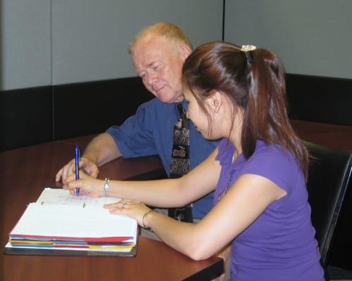 Dr. George Martin, Director of Chesterfield Learning Center tutoring student