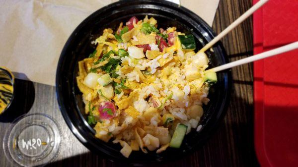 I got the large scallop Bowl, with cilantro, cucumber, tuna, wonton strips, with spicy miso sauce and the citrus sauce.