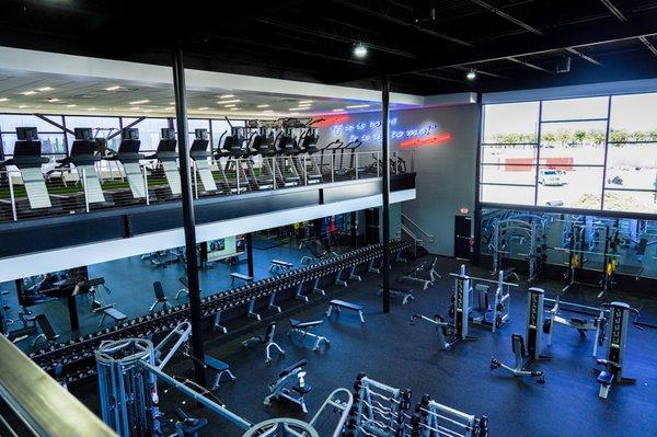 Our cardio deck overlooks the strength training equipment.