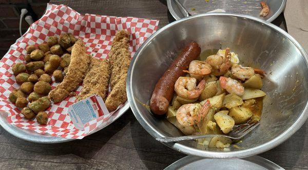 Lunch! Shrimp Platter w/sausage, corn, potatoes and egg. Fish and Okra meal.