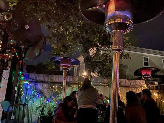 Patio with Beautiful Lights and Heated Torches.