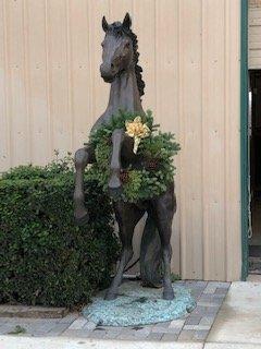 Good Morning! Even our horse statue is all decked out for Christmas!