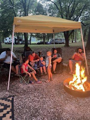 Relaxing by the fire with family