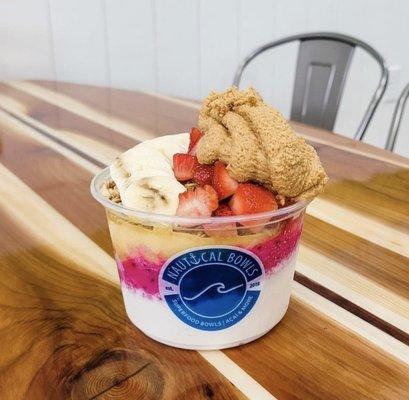 Build your own bowl and include your favs!  Here we have coconut, pitaya, mango, granola, banana, strawberries and peanut butter