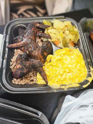 Jerk chicken wings, mac and cheese and plantains