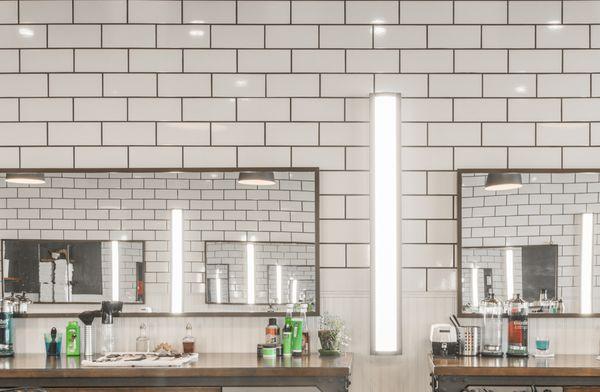 It's all in the details. We went with a super clean finish of white subway tile walls and bright lights.