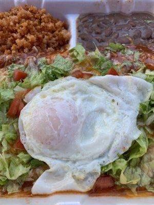 Momma Laura's Enchiladas with an egg on top the way my sister likes them!