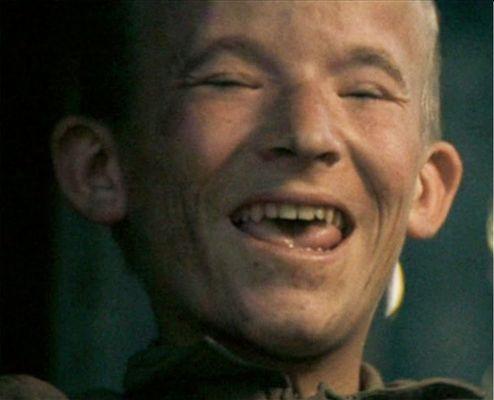 THING 2 - The goofy inbred kid from Deliverance look-alike bagboy thought psycho cashier's antics were highly amusing.