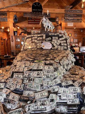 Car filled to the "rims" with bills, bills, bills