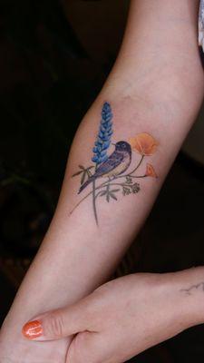 Floral and bird tattoo by Esther