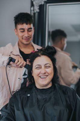 Josh doing my mother-in-laws hair the day of our wedding.