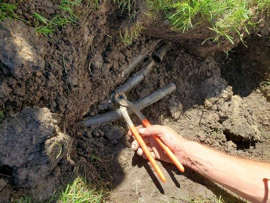 Found the flooding problem near the front main sprinkler box from a cut in poly tube line. (From Dynamic) previous Company  9/28/2021