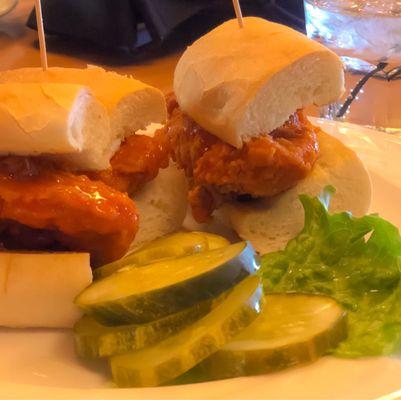 Buffalo Chicken Sliders with extra pickle on the side .