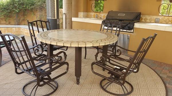 Round stone-top dining table and chairs restoration