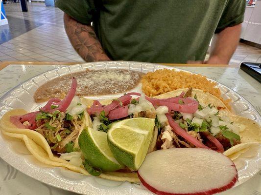 Carnitas tacos with rice and beans