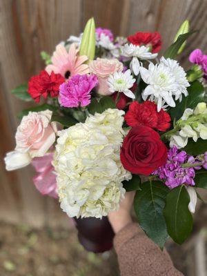 A variety of roses, chrysanthemum, Lillie's, daisies and hydrangeas!