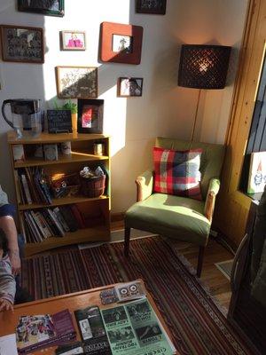 Cozy waiting area with drinks, toys, & books