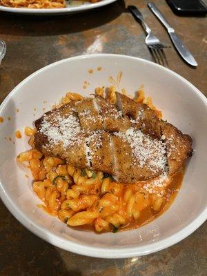 freshly handmade gemelli pasta with blush Zola sauce + breaded chicken