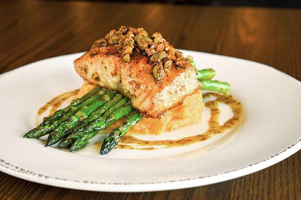 Maple-glaze roasted salmon, candied pistachios, roasted asparagus, and garlic mashed potatoes.