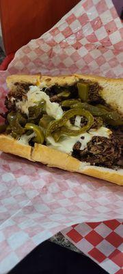 Italian beef with cheese and sweet peppers