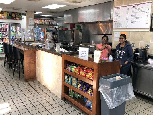 Counter, Menu Board, and Friendly Staff