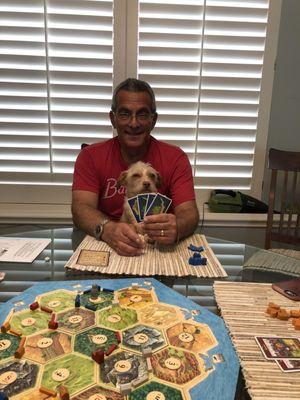 Winston helping Dad play cards.