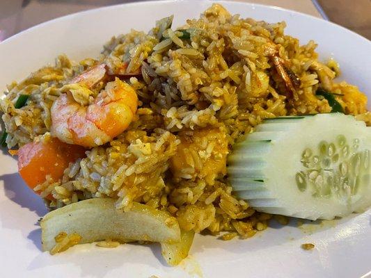 Mango Fried Rice -Shrimp and chicken stir fried with mangoes, egg, onions, scallions and tomatoes with a touch of curry powder